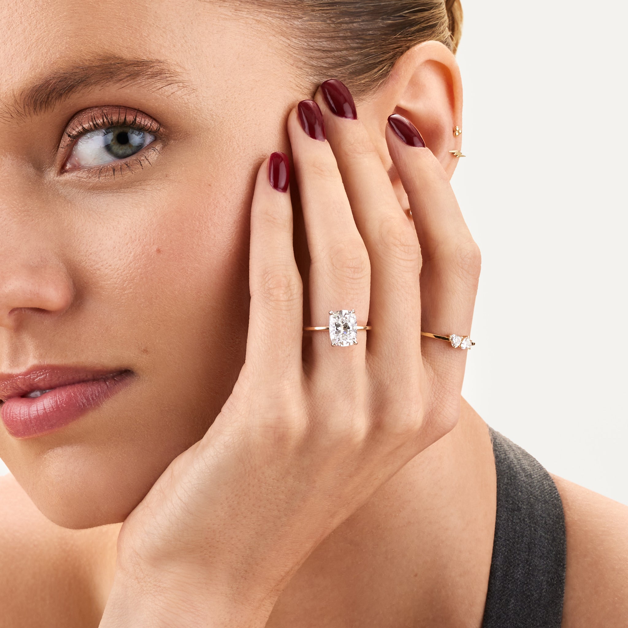 Cushion  lab diamond engagement ring on model.
