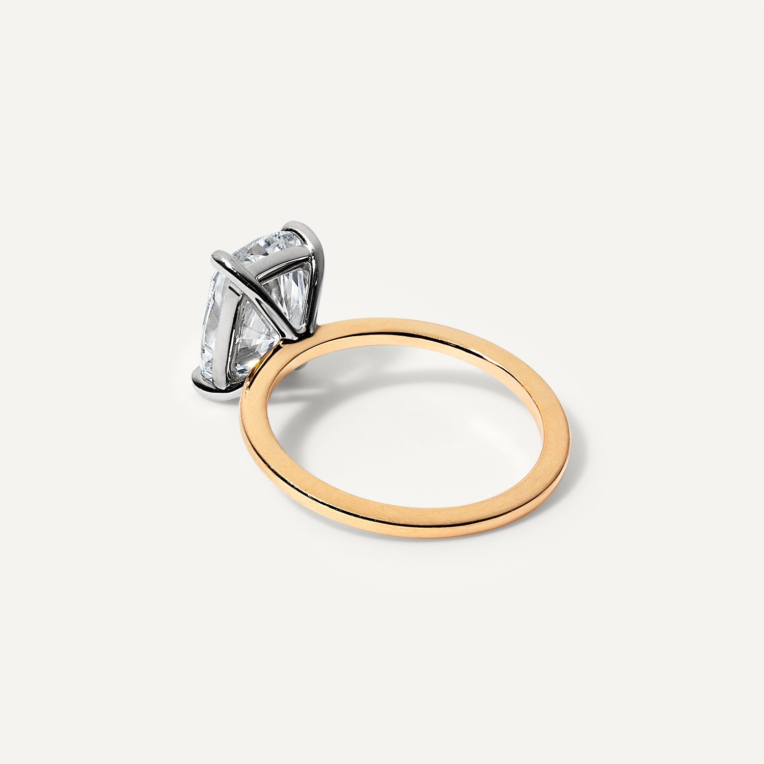 Cushion lab diamond engagement ring side profile.