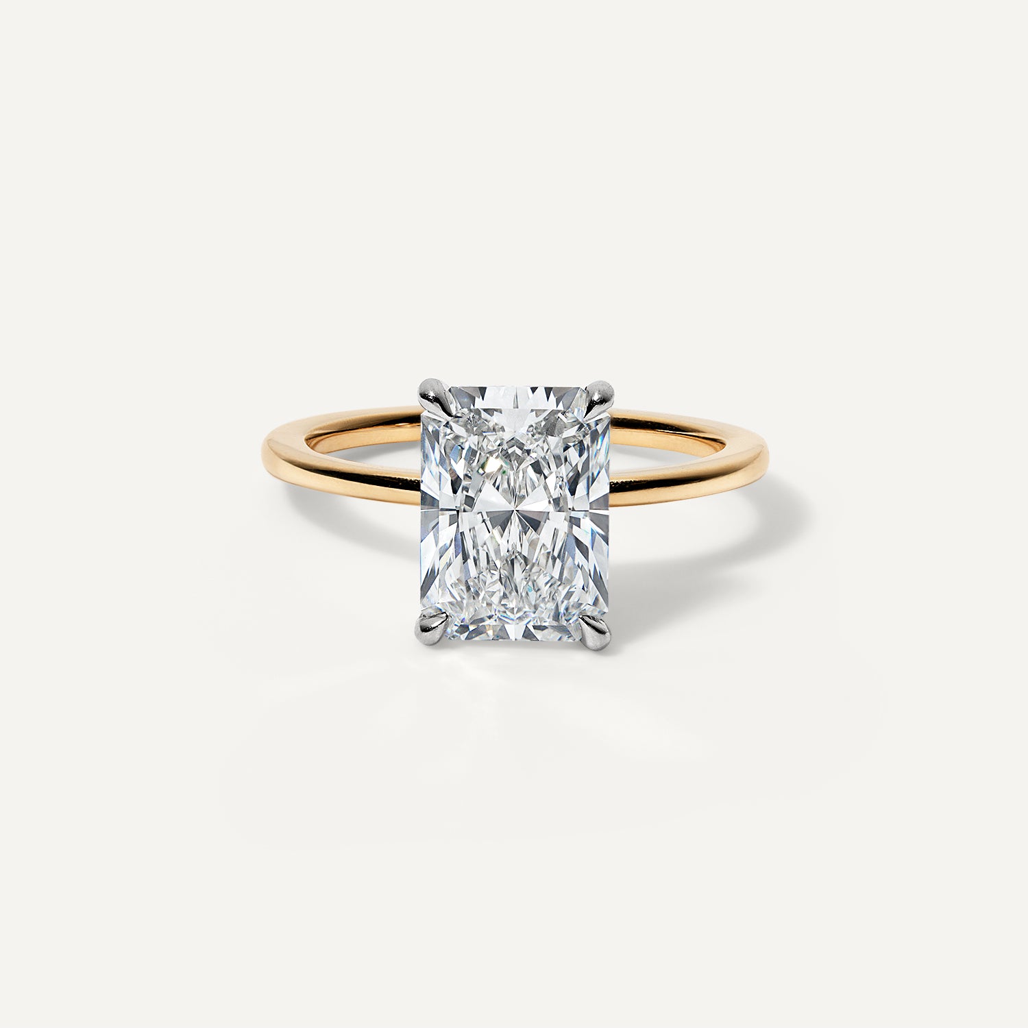 Radiant lab diamond engagement ring.