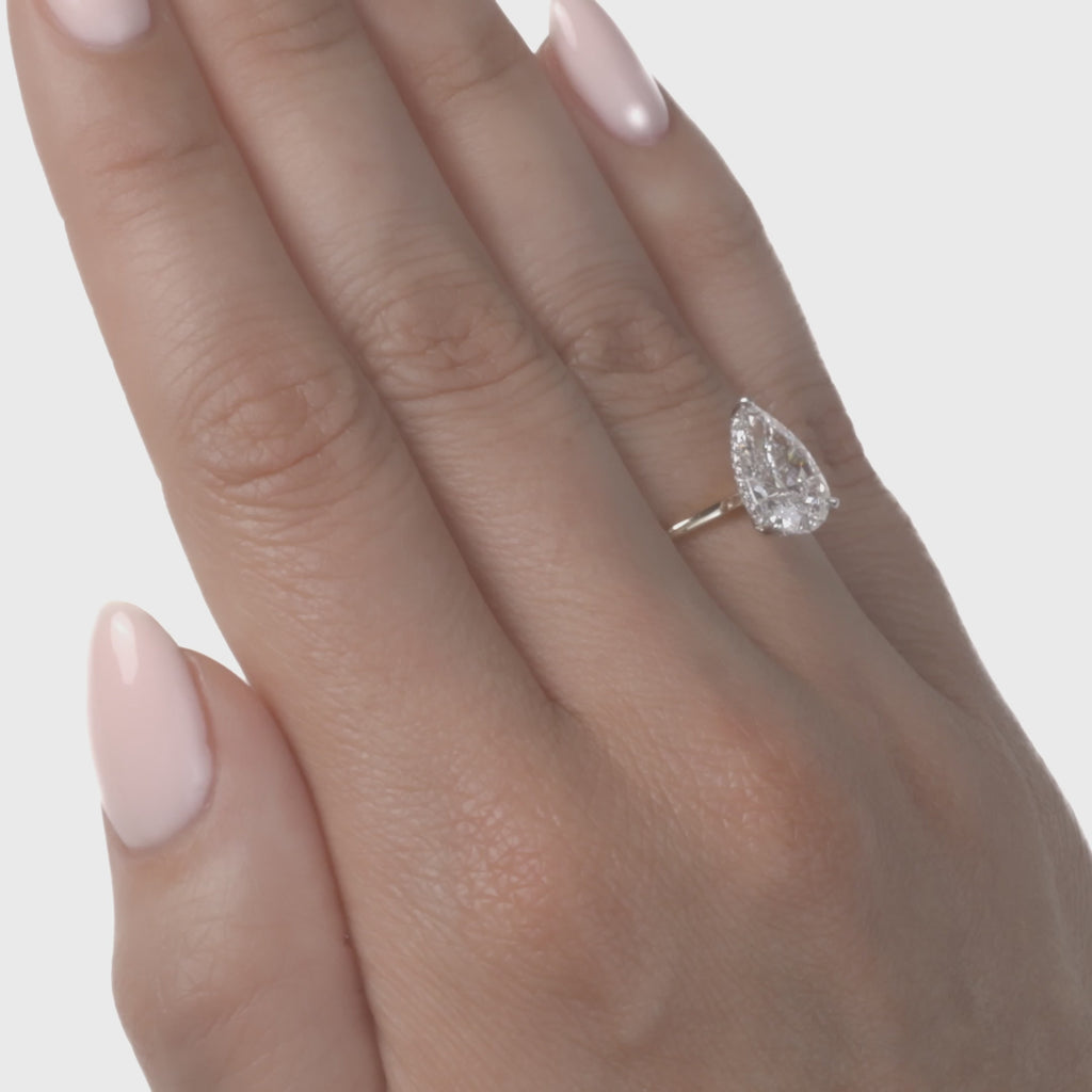 Pear lab diamond engagement ring