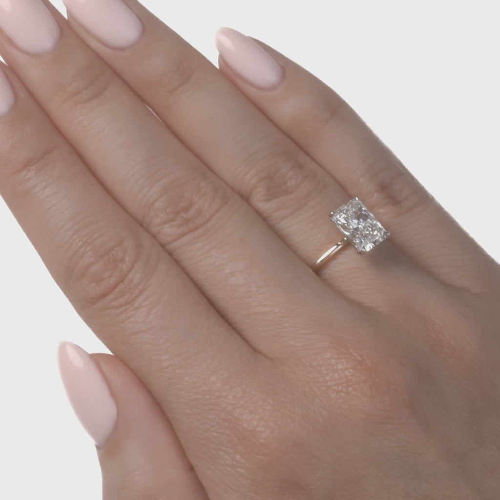 video of Radiant lab diamond engagement ring.