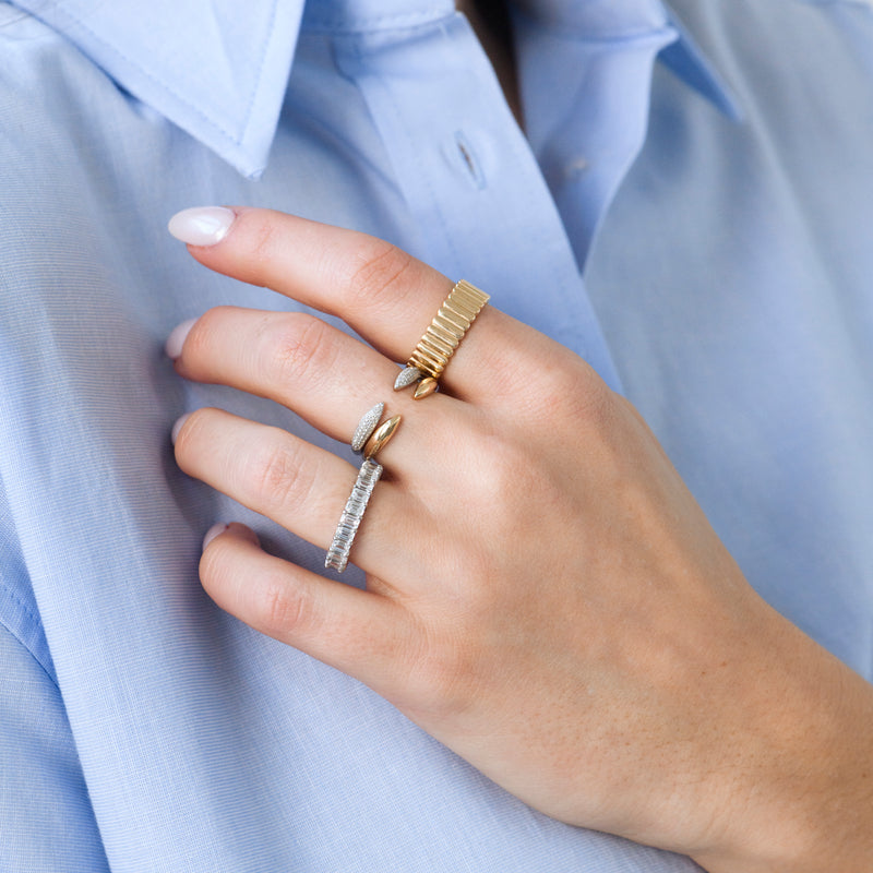Petite 14k gold claw ring on model