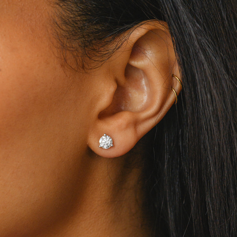 Diamond stud earrings.