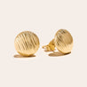 Textured 14k gold button stud earrings.
